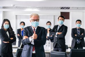 Employees in office with masks on